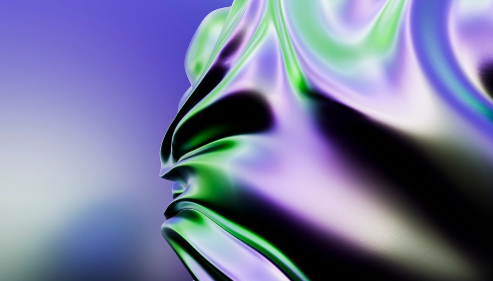 Close-up of a shiny metallic texture with folded surfaces showcasing iridescent purple and green hues in an abstract modern design.