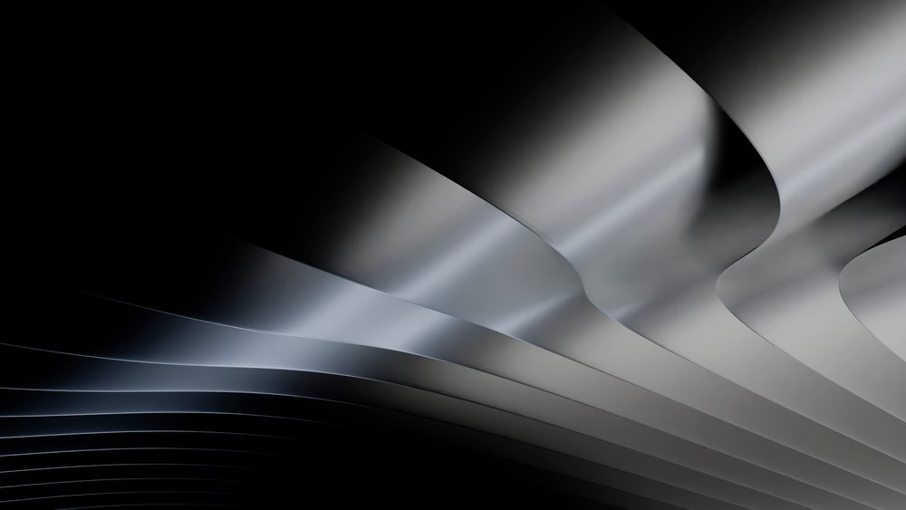 Curved metal sheets create abstract wave patterns on a smooth metallic surface set against a dark background.