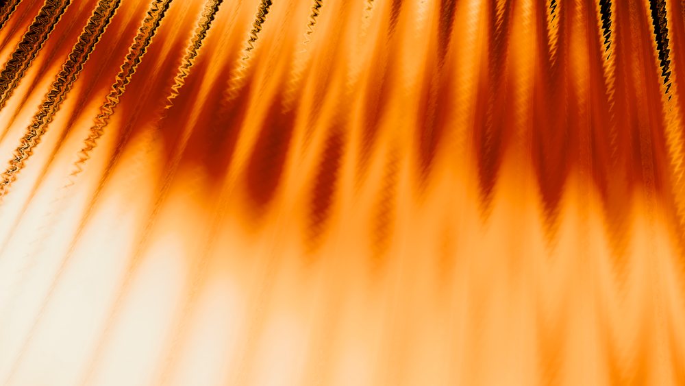 Abstract orange vertical streaks with flowing texture and vibrant gradient lighting create a dynamic background.