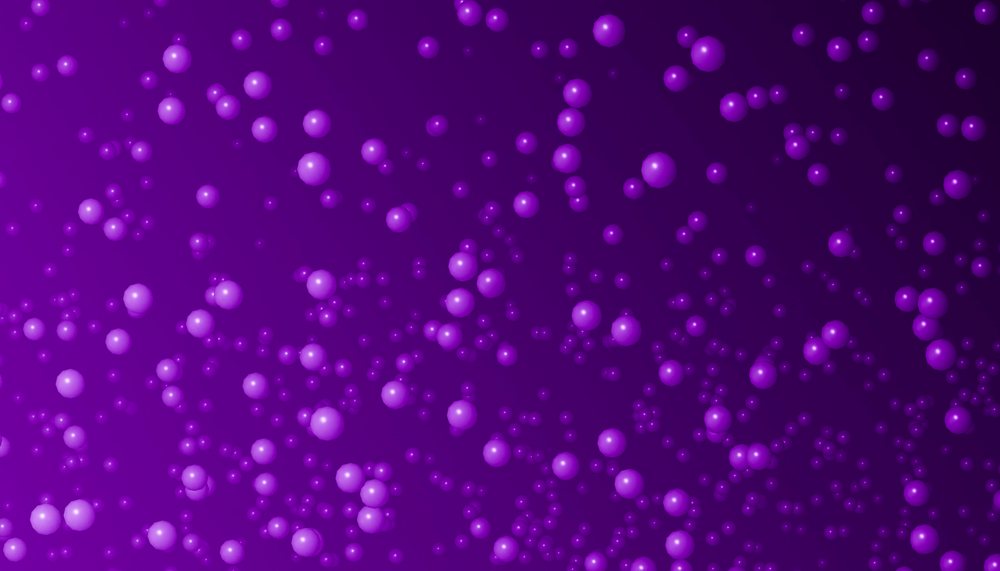 Purple spheres of various sizes floating on a matching purple background forming an abstract digital pattern.