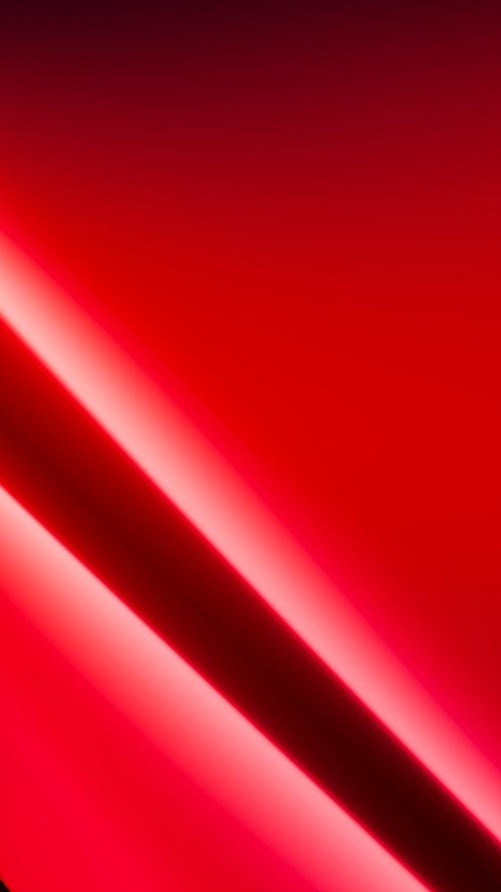 Abstract red background with a shiny glossy gradient.