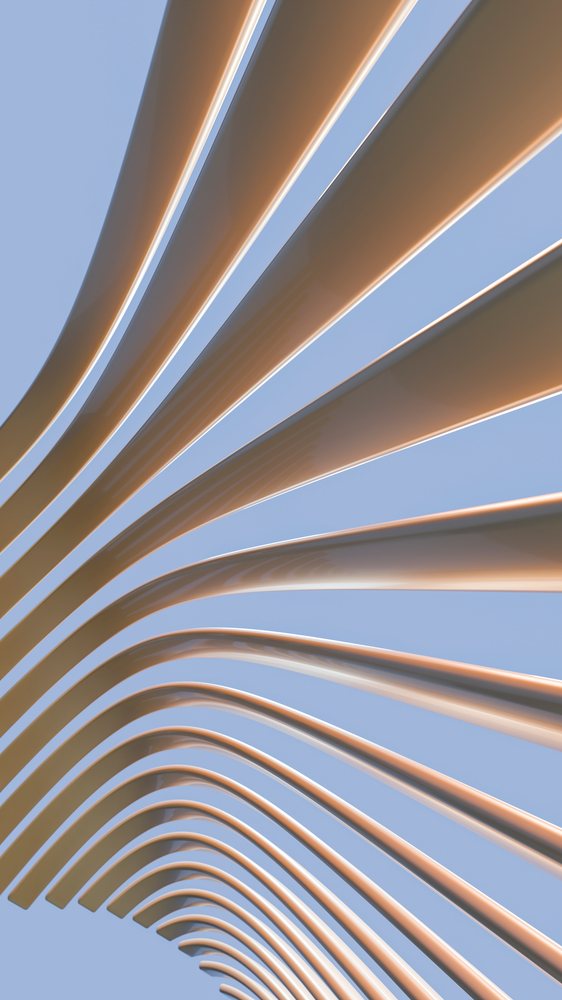 Abstract outdoor sculpture of curved steel bars against a blue sky, viewed from above.