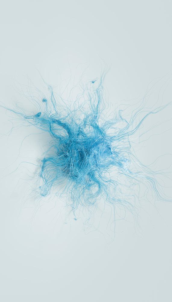 Blue tangled fibers forming an abstract and dynamic cluster on a light background.