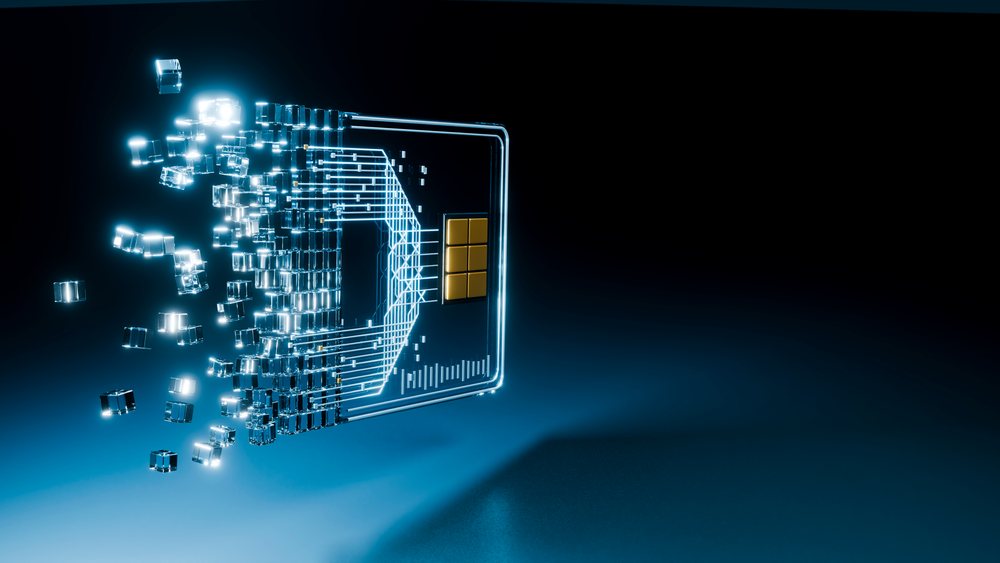 Transparent credit card with visible microchip and dispersing blue digital cubes symbolizing fintech data transfer.