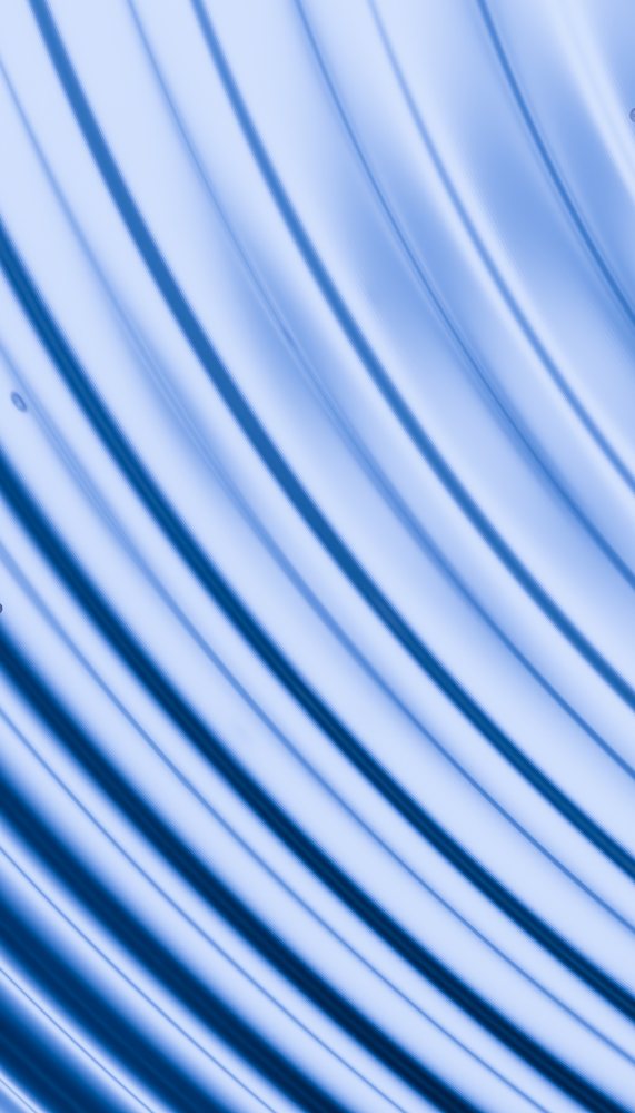 Digital illustration of abstract blue smooth curved lines forming a flowing wave pattern wallpaper.