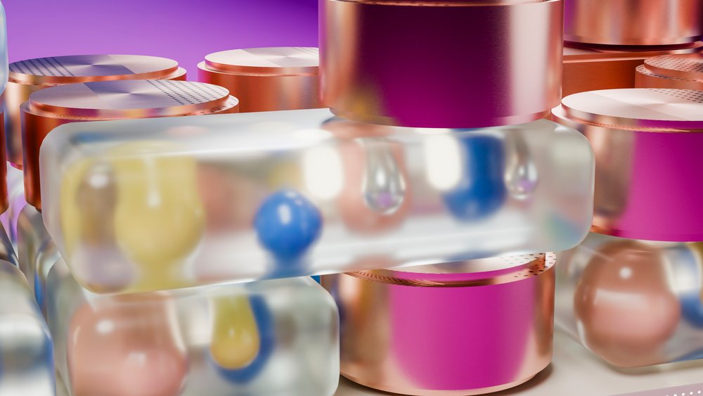 Colorful abstract spheres and droplets embedded within glass blocks topped by orange metallic circles in a digital 3D macro illustration.