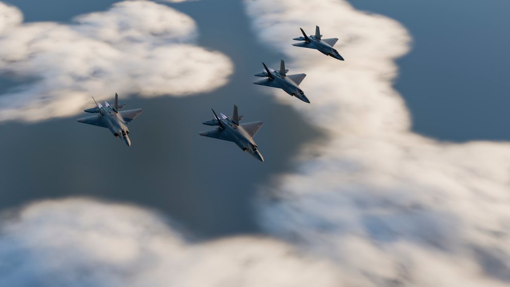 Four fighter jets fly in close formation above clouds under a clear blue sky during daylight, defense, war, security, military.