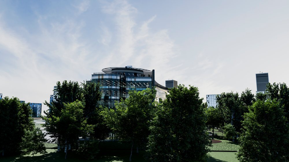 Modern office building with glass facade amidst trees under a blue sky in an urban business district.