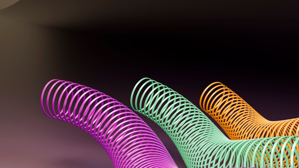 Three colorful purple, green, and orange slinky toys with curved coils on a dark background in a digital 3D illustration.