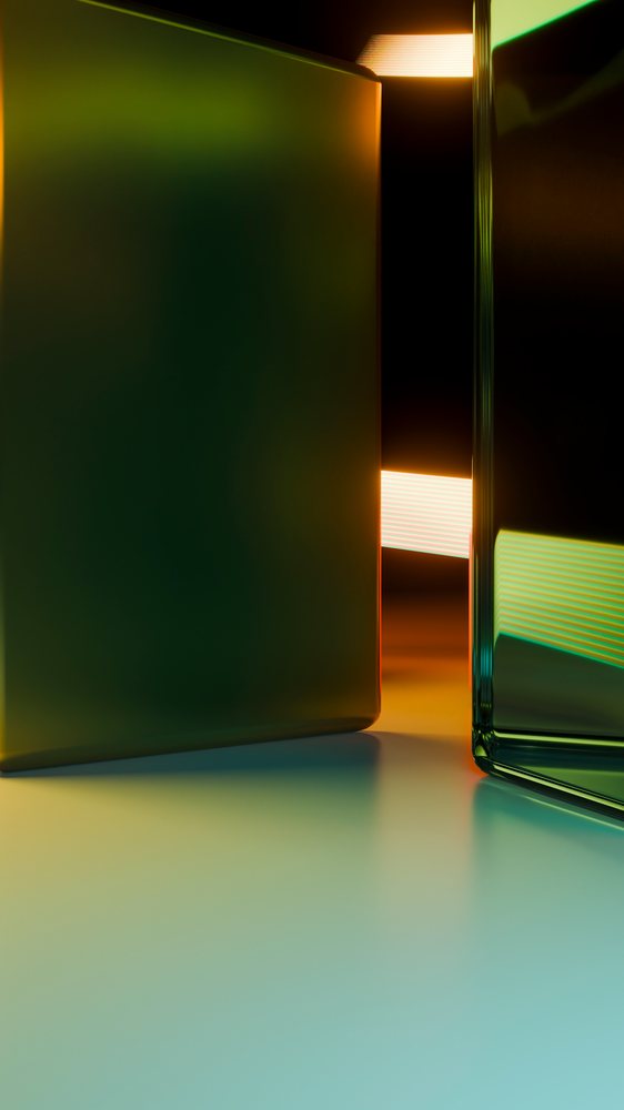 Close-up of two transparent glass containers filled with liquid.
