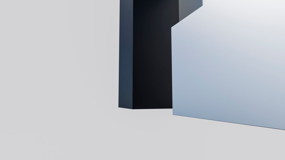 Abstract digital artwork featuring geometric black and gray shapes with sharp edges and shadow play on a white background.