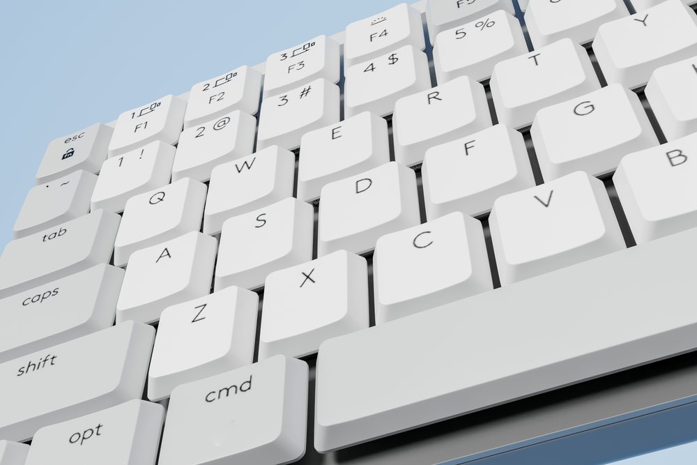 Close-up of a white computer keyboard with visible letters and function keys on an abstract render background.