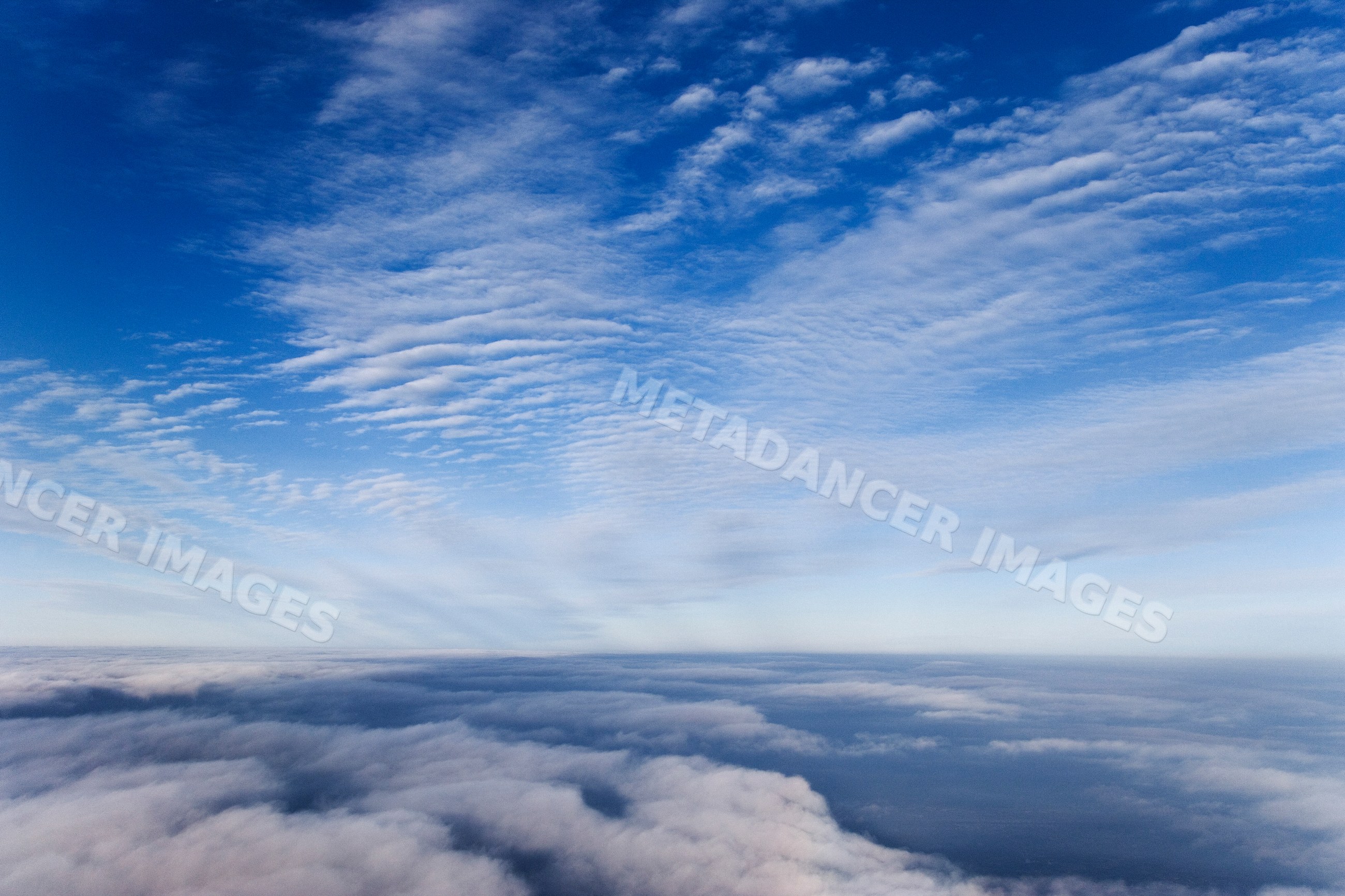View of sky and clouds flying over Japan in winter
