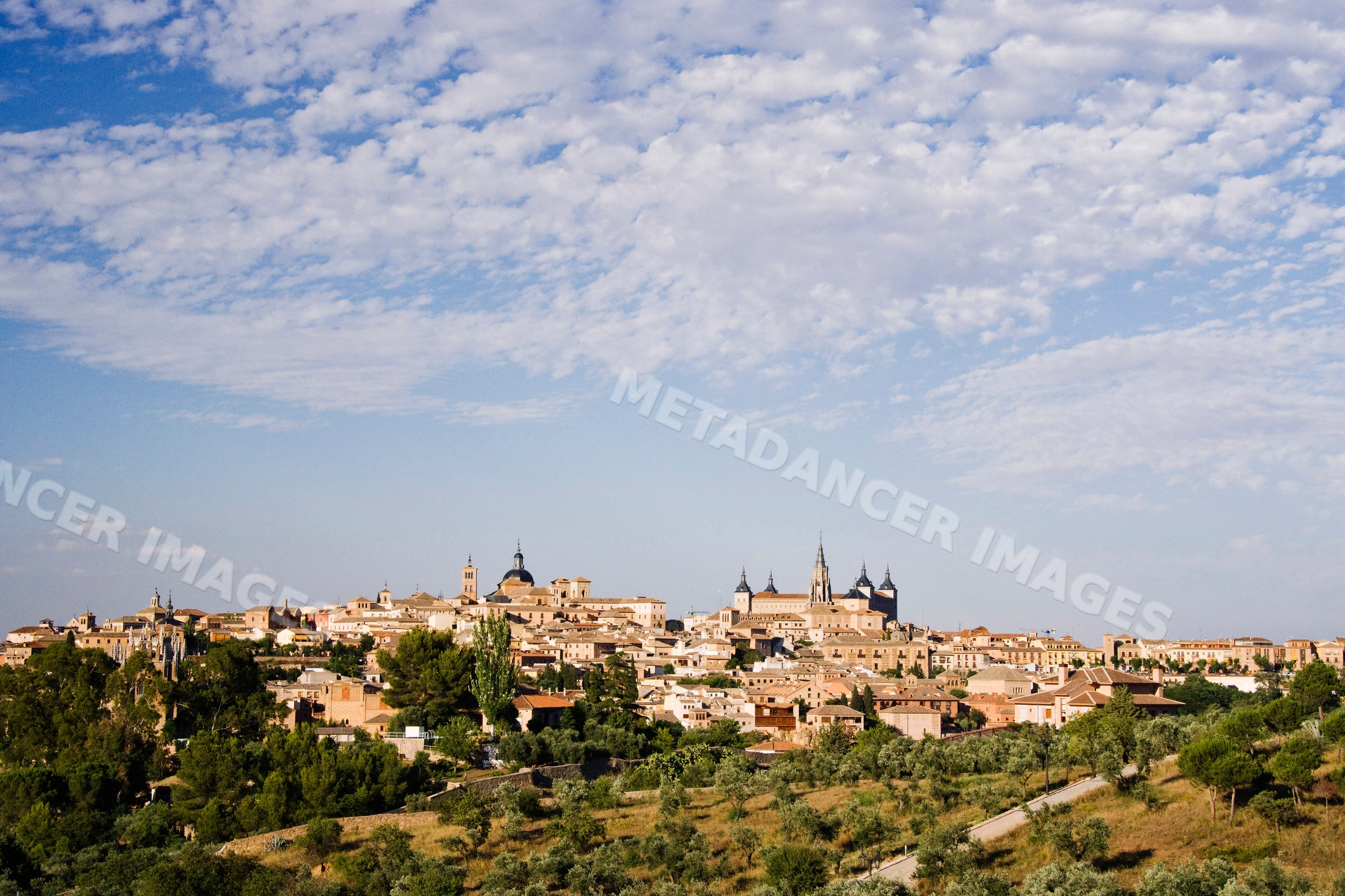 Cityscape of historic toledo, Spain under blue sky