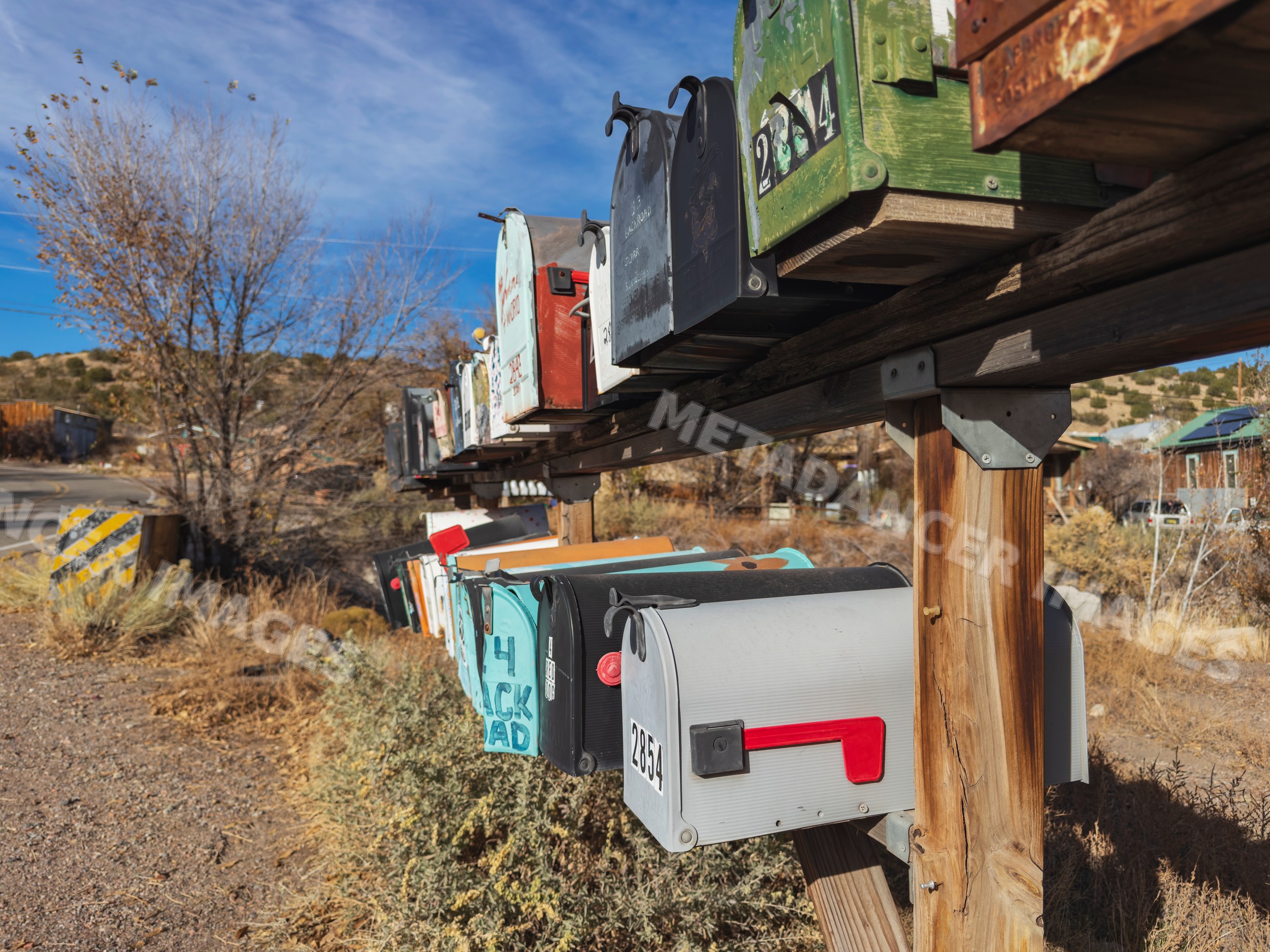 Row of rural Mailboxes on roadside in madrid new mexico, USA