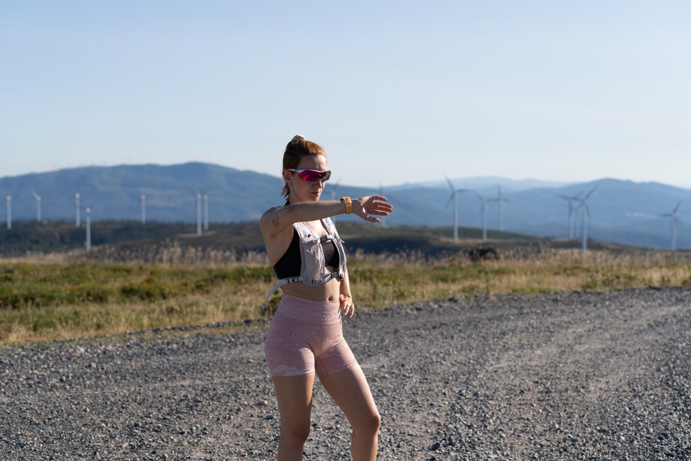 White Woman stretching during outdoor workout