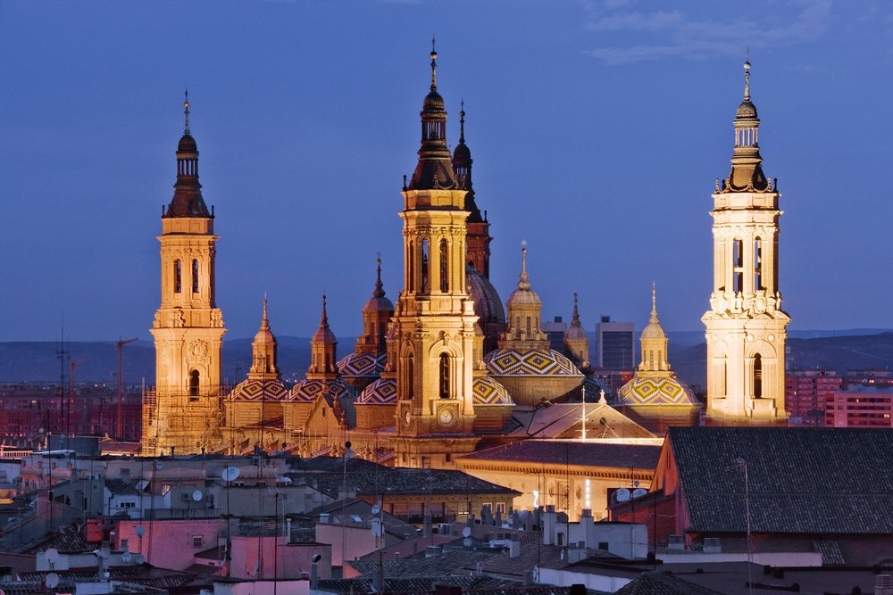 Cathedral of our lady of the pillar illuminated at dusk Spain