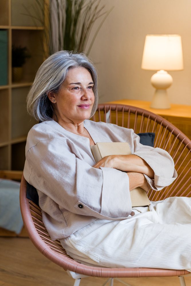 Mature white woman reading and relaxing
