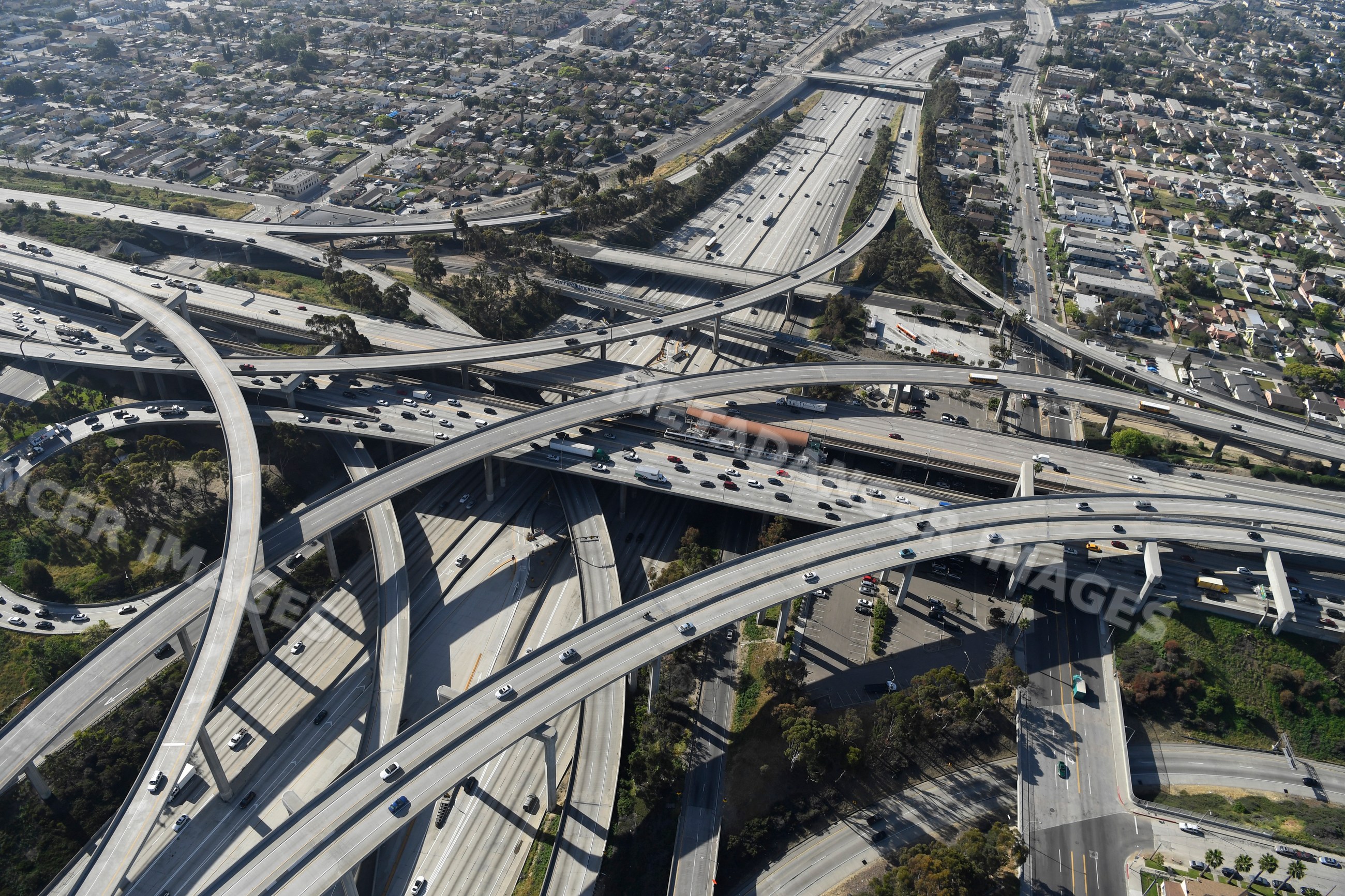 Highway interchange with freeway overpasses and traffic in a beach