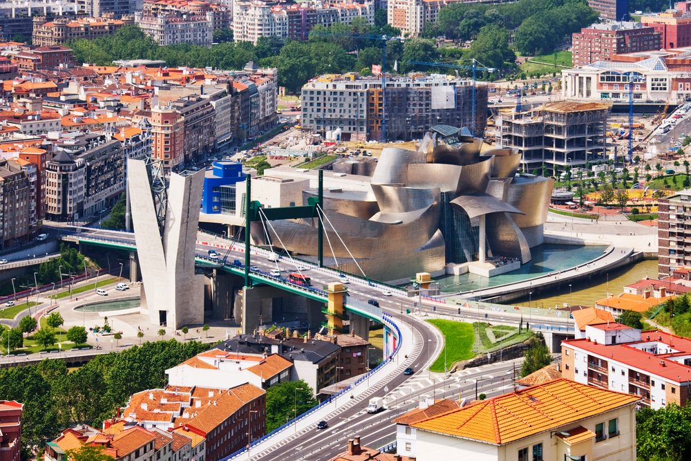 Guggenheim museum and bridge over river Spain cityscape