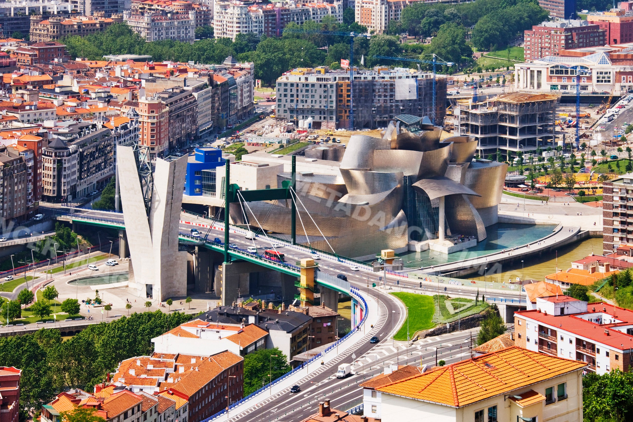 Guggenheim museum and bridge over river Spain cityscape