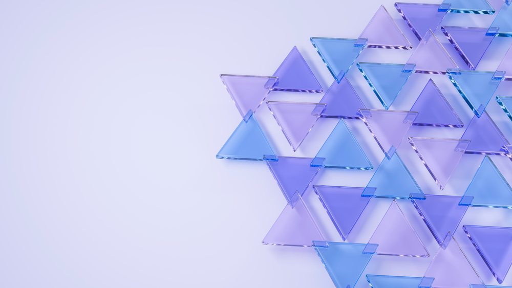 Transparent blue and purple glass triangles overlapping