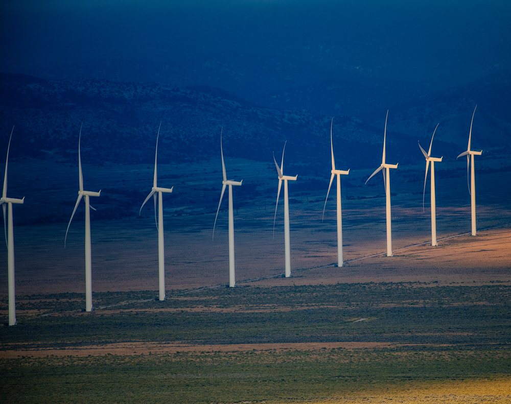 Wind turbines generating energy in Nevada desert landscape
