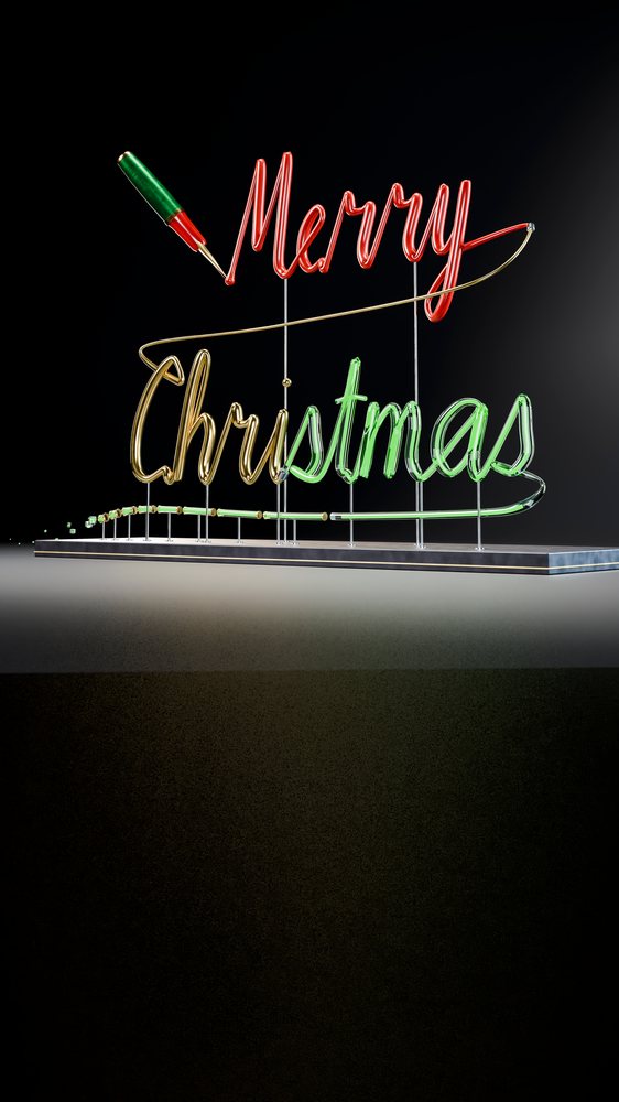 Neon sign spelling merry christmas in festive colors
