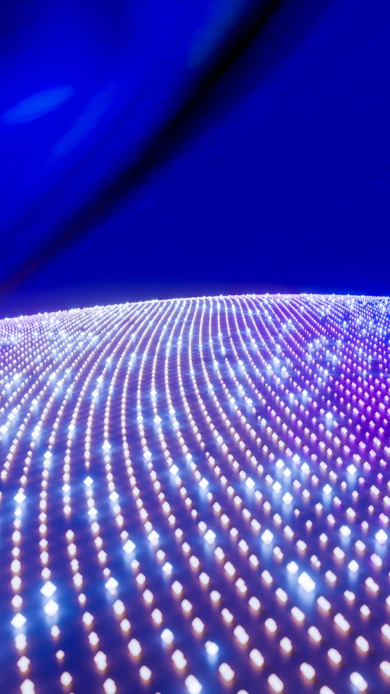 Digital lights forming glowing blue and purple wave pattern