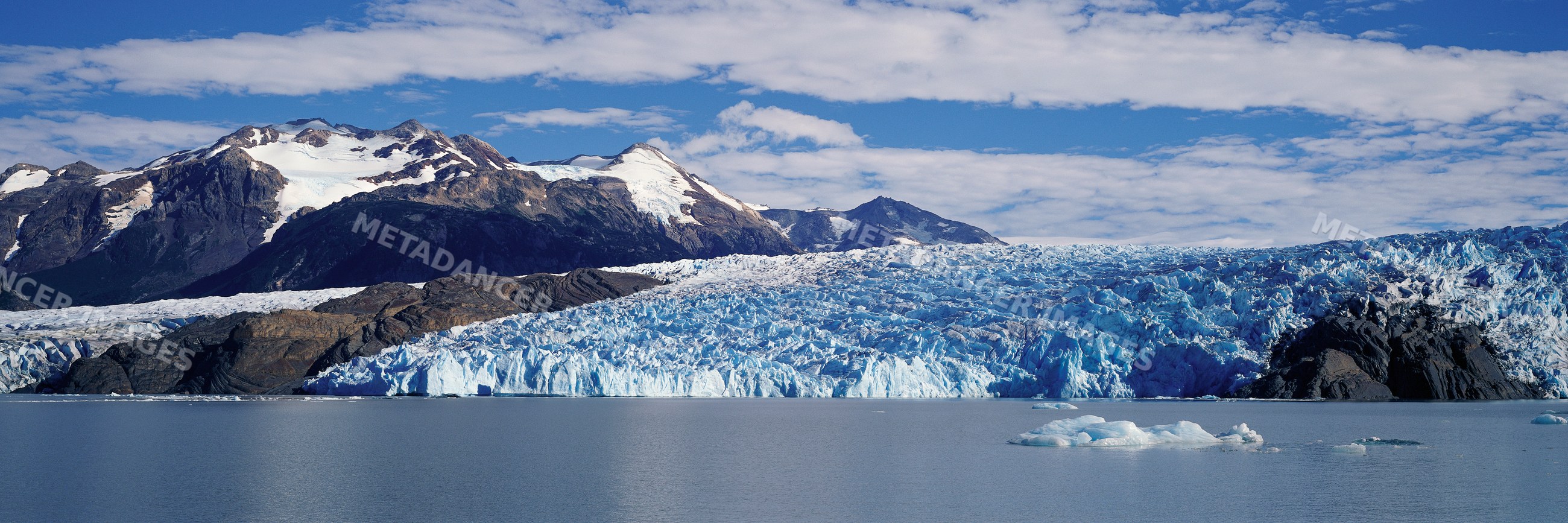 Glacier and snow-capped mountains at lago grey, chile