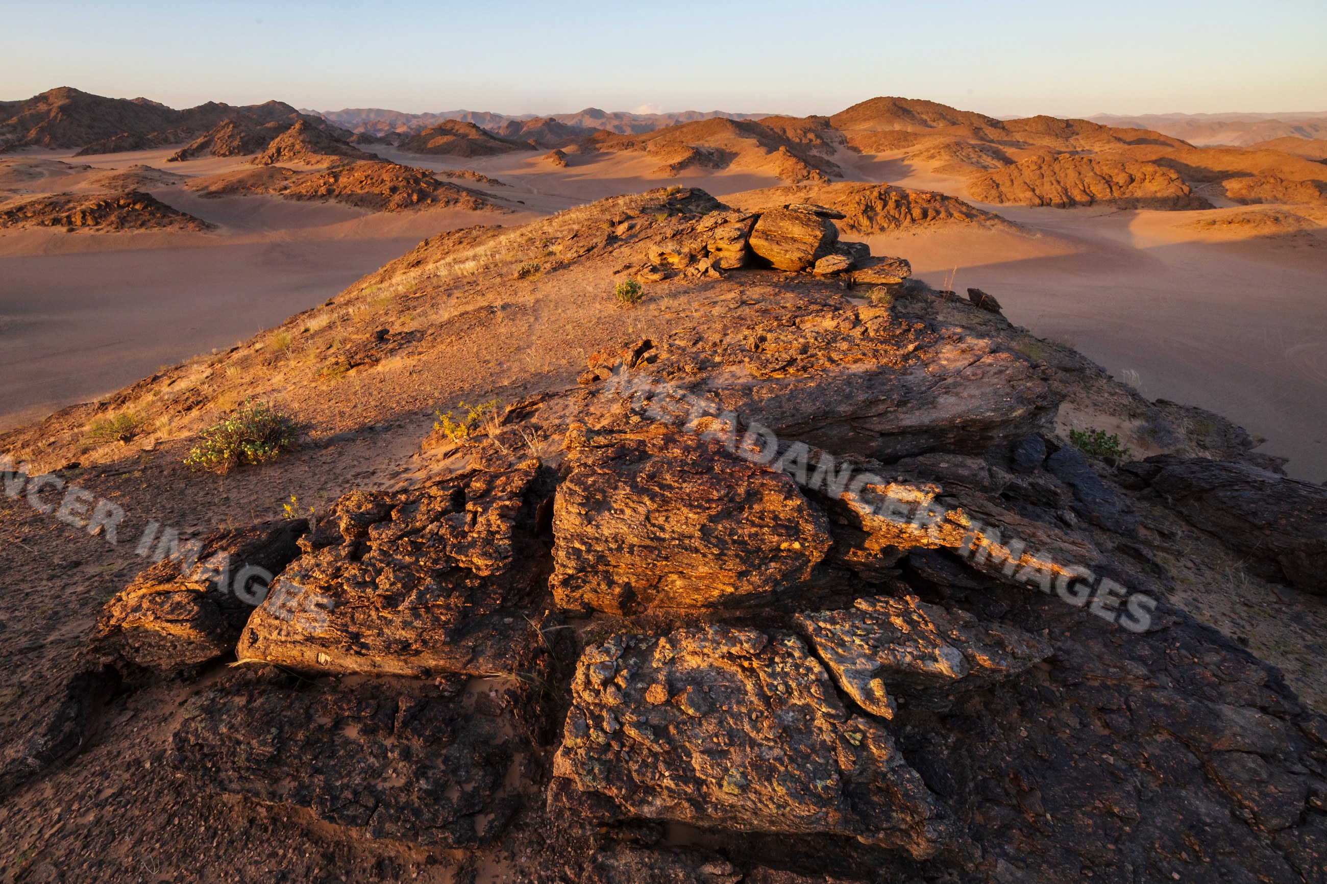 Hoanib river valley Sunset rocky desert landscape