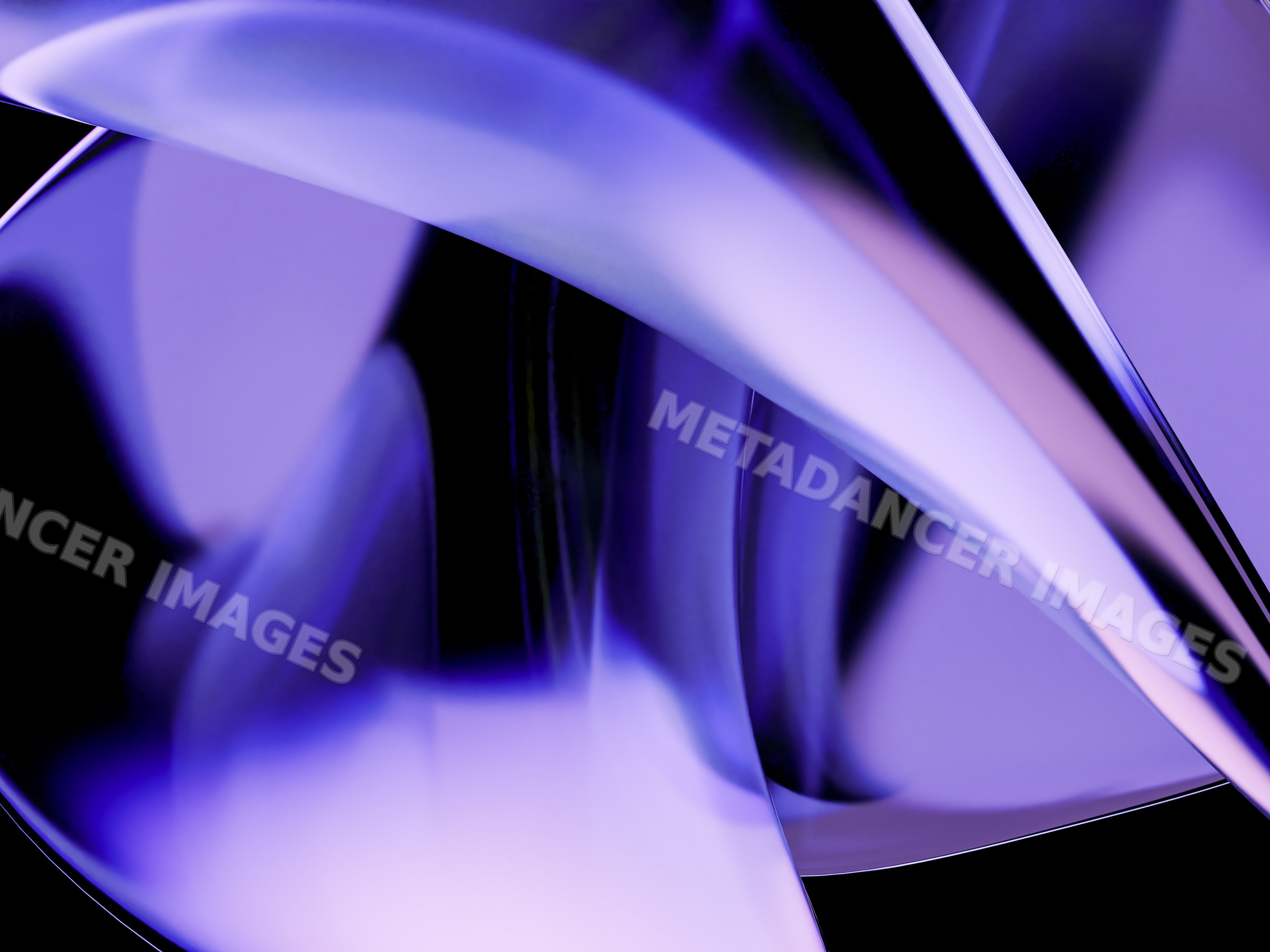 A close-up view of a modern abstract sculpture with smooth curved