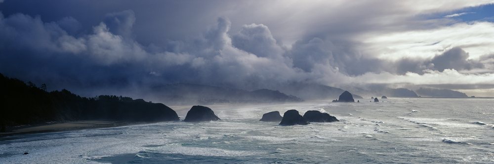 Rocky coastline with mist and waves