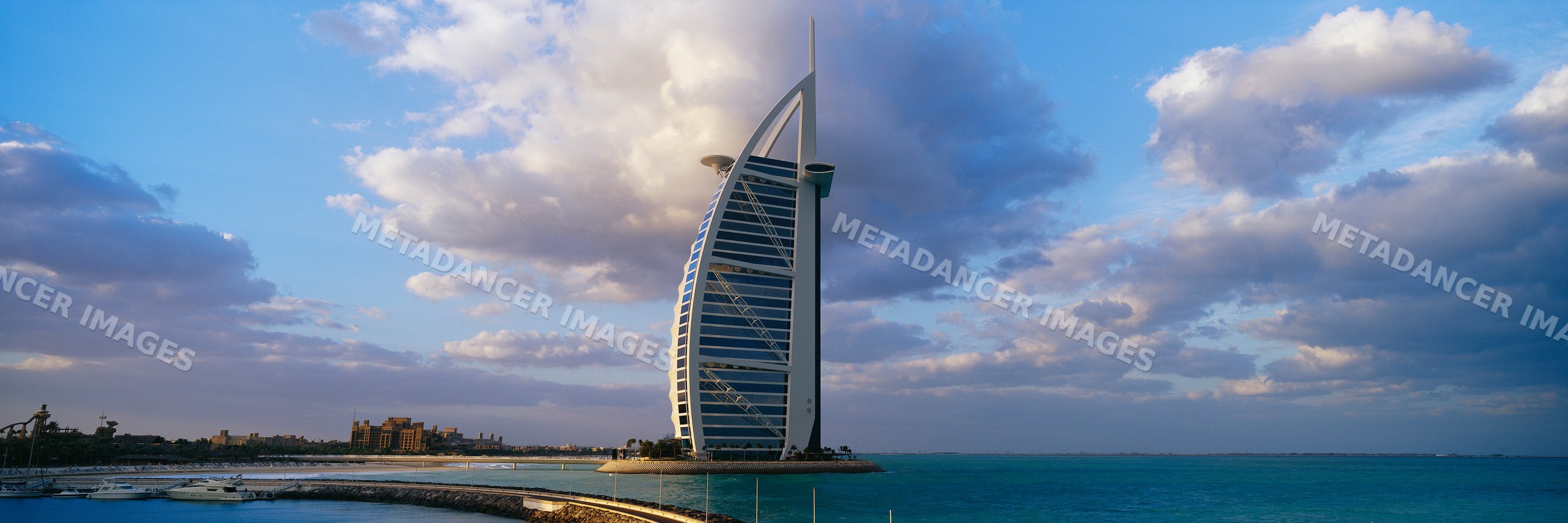 Burj al arab hotel on dubai coast with sea and sky