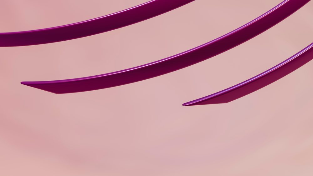 Curved purple fork tines close-up on pink background