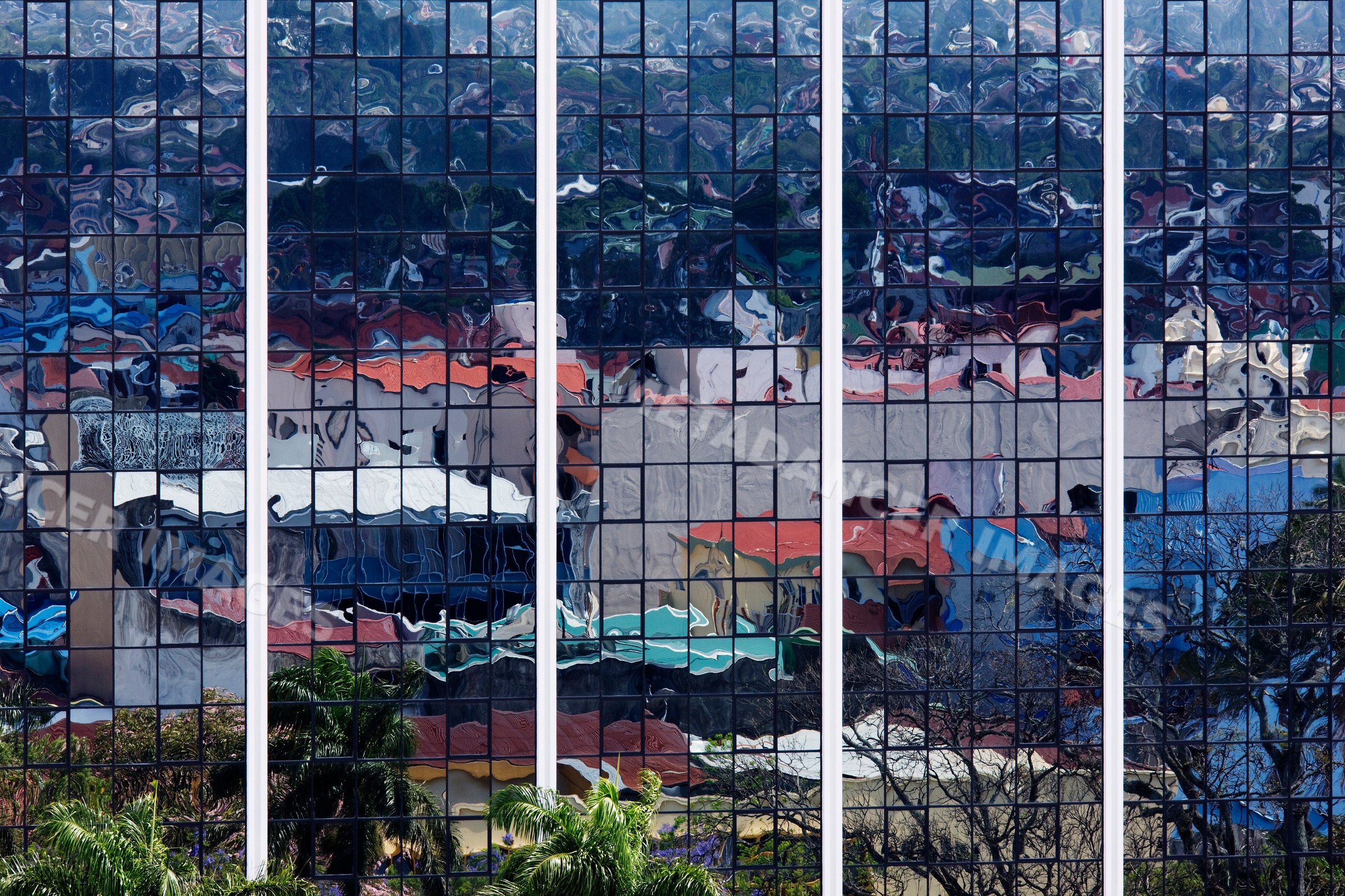 Reflection on a glass facade of a modern building costa rica