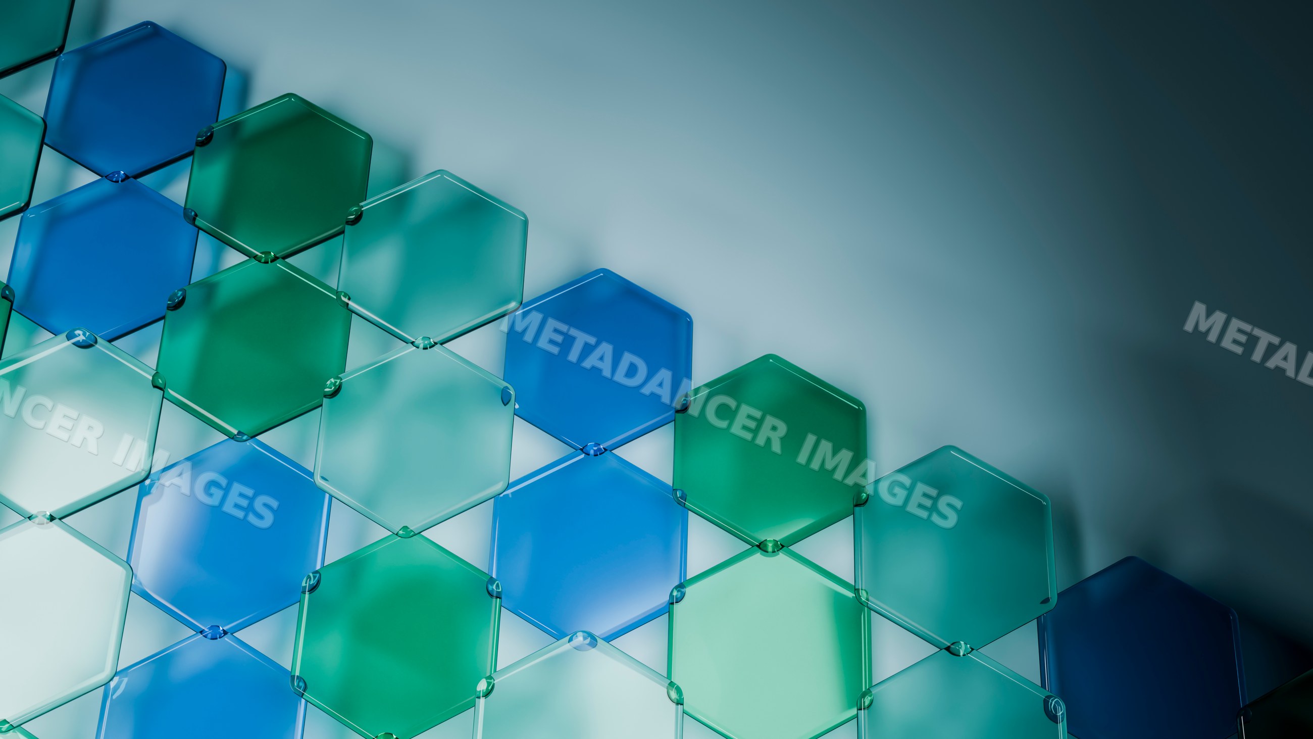 Hexagonal translucent blue and green tiles forming geometric wall