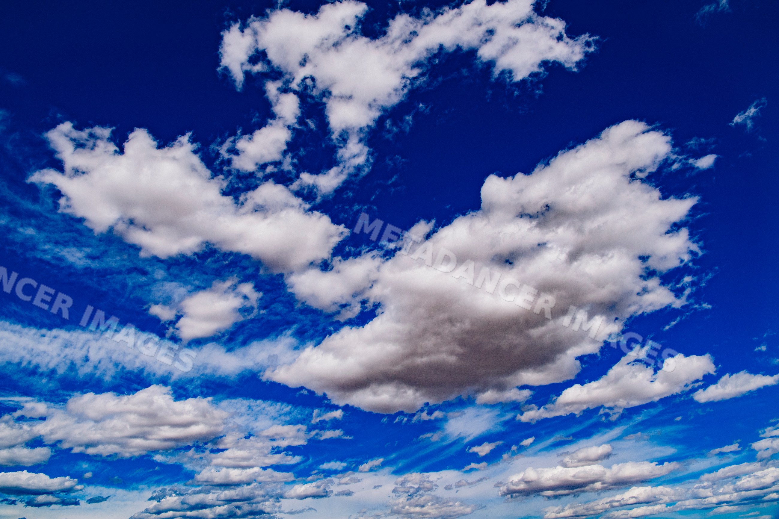 Blue sky with white fluffy clouds in daylight outdoors in Nevada, USA