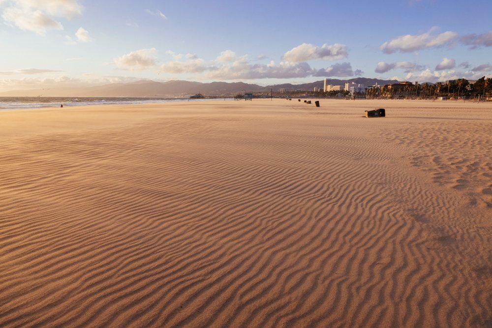 Venice Beach sand ripples and coastline at sunset
