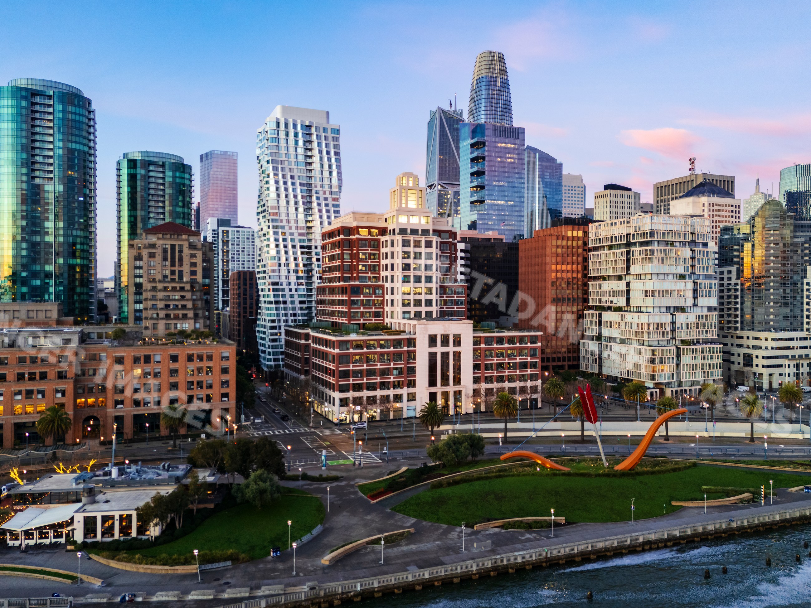 San Francisco skyline from pier 14 waterfront at sunset