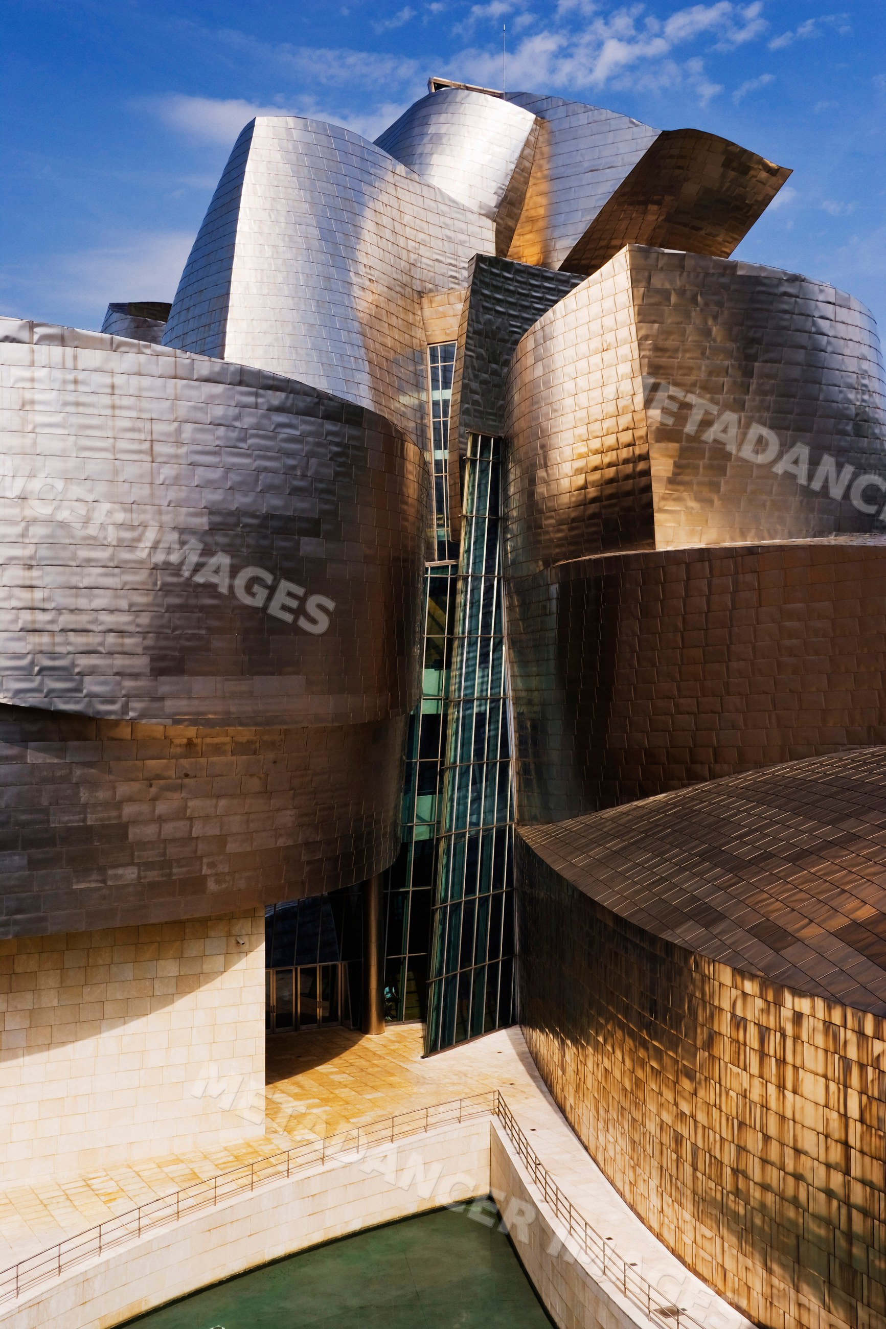 Guggenheim museum with curved metal architecture, Spain
