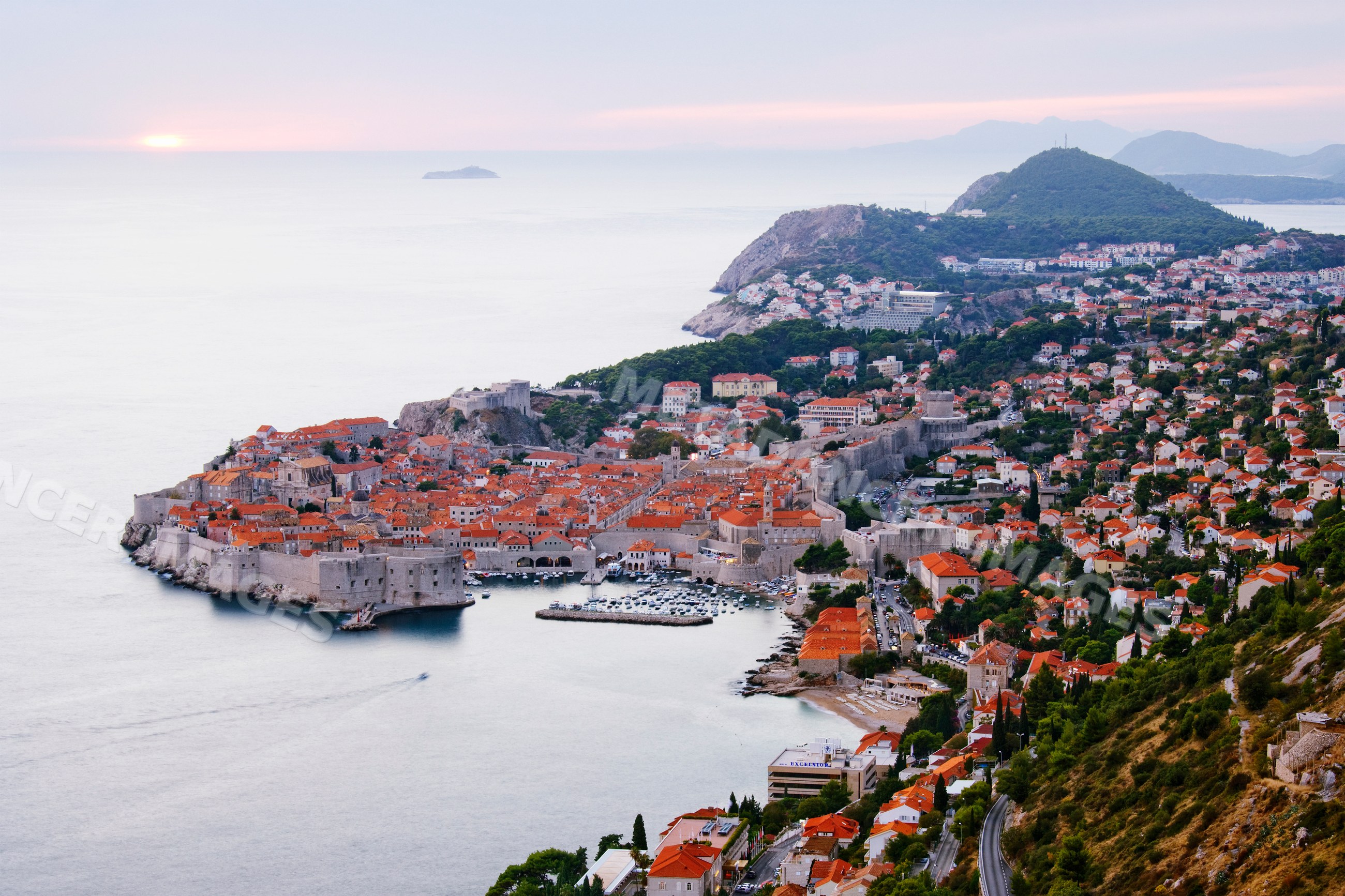 Old city of dubrovnik on adriatic coast at sunset