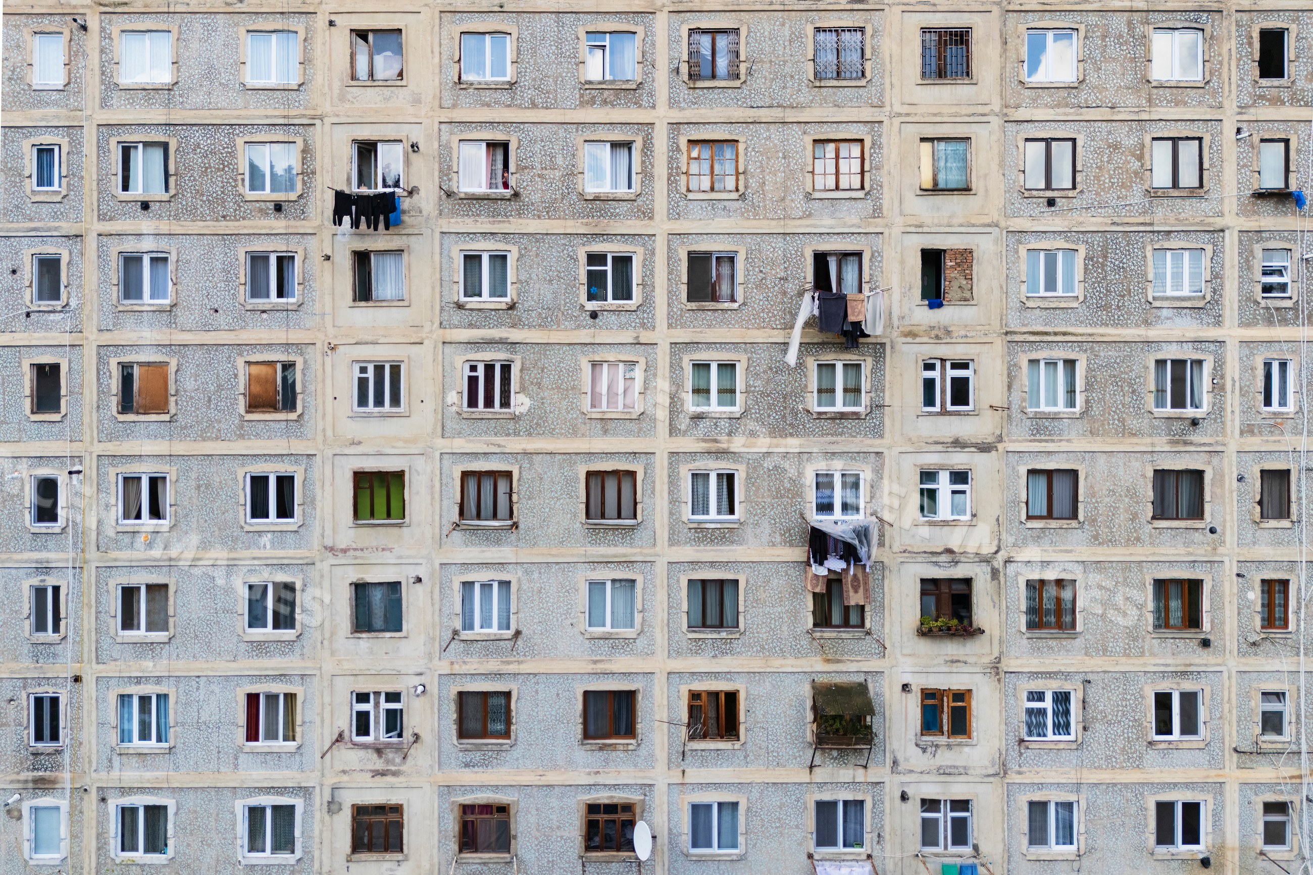 Soviet-Style Apartment Blocks with windows and laundry