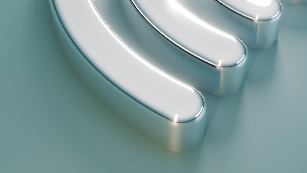 Close-up of shiny metallic abstract curved object with smooth surface