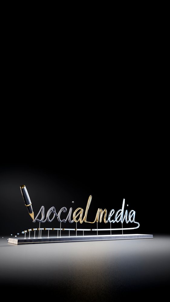 Metallic script spelling 'social media' with ink pen drops