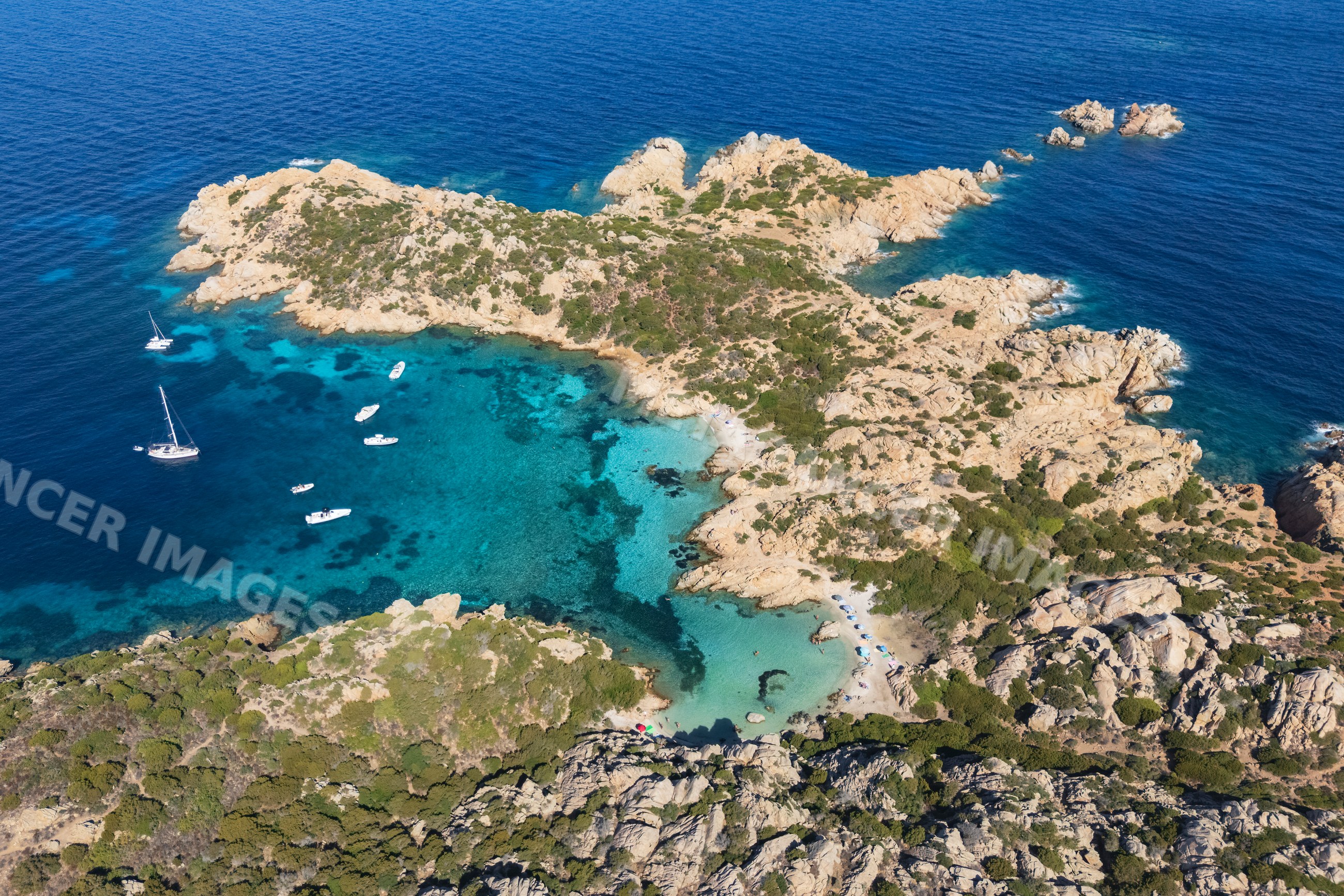 Cala Napolatana beach and cove in la maddalena, sardinia, italy