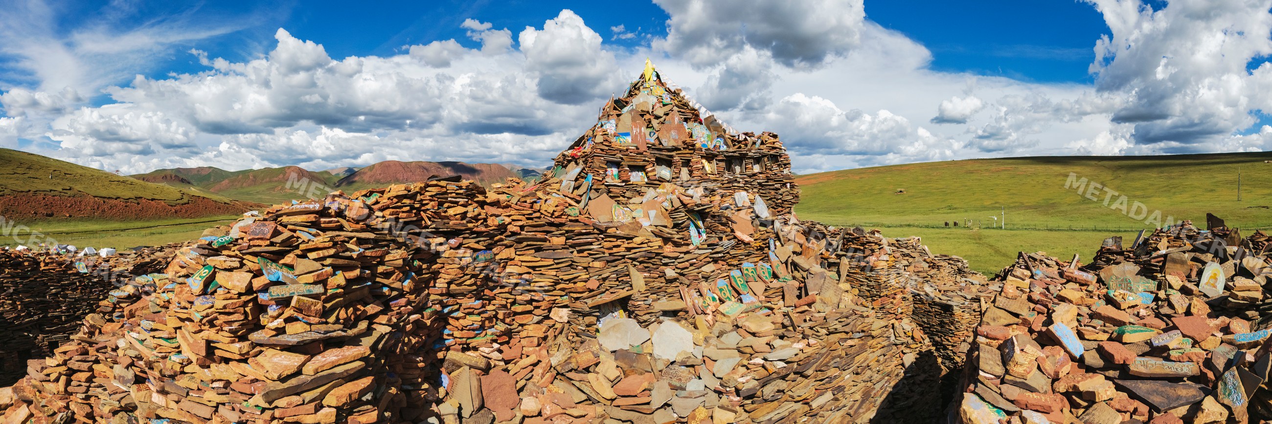 Mani Wall of stacked prayer stones in songge mani shijingcheng