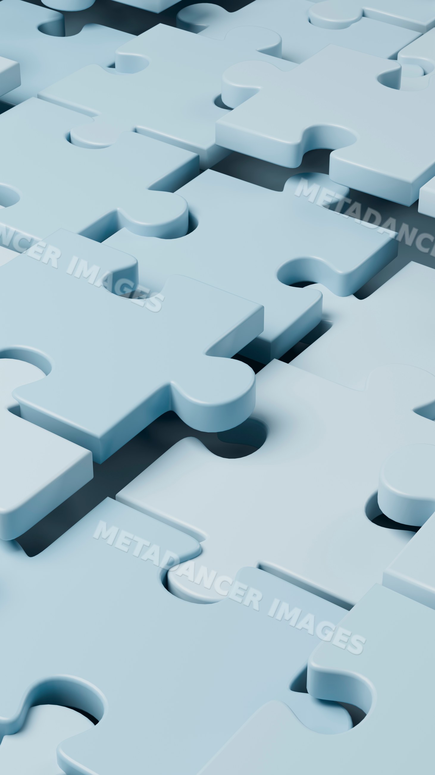 Close up of scattered blue interlocking 3d puzzle pieces