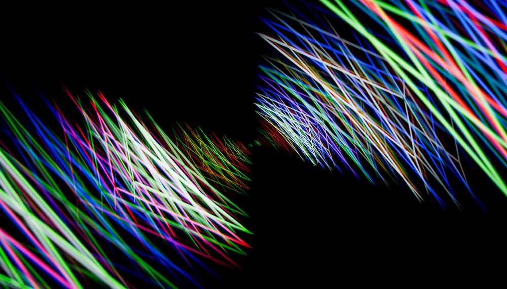 Abstract digital illustration of colorful diagonal light lines
