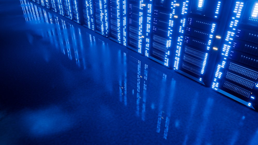 Server racks illuminated by blue lights in data center